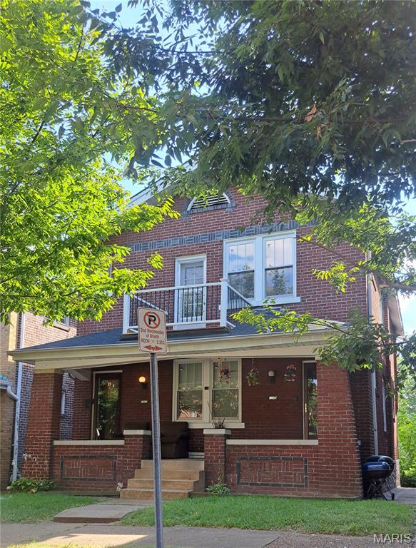 This attractive brick Duplex is a great real estate investment with 2 rental units for income. Spacious units with 2bdrm 1 ba. Featuring hardwood floors, large closets, sunrooms, a delightful front porch and a balcony on the 2nd floor.  Eat in kitchen, with seperate formal dining room, large size living room with stain glass windows and lots of charm! Both units share a 2-car parking area in rear of property. Lower level walkout has laundry hookups with plenty of space for storage space. Both units are currently  rented.  First floor tenant is month to month and has been leasing for many years. The second floor tenant lease expires April 2027. Newer updates include: Remodeled 2nd floor balcony, both sun rooms and water heaters. Newer HVAC system  on 2nd floor. The 1st floor has window units and radiator heating. Selling As - Is. Seller will not provide any inspections or repairs! Use Special Sales contract. Only the2nd floor unit is available to show. Please do not distrub 1st floor tenant.