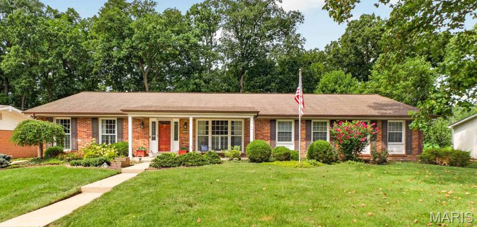 A simply stunning, move-in ready ranch home awaits you in one of Kirkwood's most popular neighborhoods! This 3+ bedroom home has been thoughtfully updated and meticulously maintained, with over 2,600-sq feet of living space on a lush .3-acre lot! With its lovely hardwood floors and stunning millwork, this home offers casual, elegant style with a flexible floorplan. Its impressive foyer leads to a large dining room with floor to ceiling windows. The center family room features a gas fireplace and built-in bookcases and adjoins the updated eat-in kitchen. Featuring skylight lighting, granite countertops, custom 42-in cabinetry, stainless and cabinet-front appliances, new ice-maker, vegetable sink and beverage center, the kitchen is nothing short of fabulous. It adjoins a gorgeous sunroom, with views of the wrap-around, no-maintenance deck, perfect for morning coffee or evening entertaining. A lovely office, with custom plantation shutters, can also be used as family room or alternate dining space. The spacious primary bedroom suite is a lovely retreat, with 3 separate closets--the walk-in includes LG stacked washer & dryer, and French doors leading to the deck. Two additional main-level bedrooms are bright and welcoming, with a full bath nearby. The lower level rec room features its original cedar paneling and can be divided for playroom, office, media or sleeping quarters, with a full bath, bar areas and loads of convenient, unfinished storage. The lush, private backyard includes an irrigation system and lovely hardscaping. An oversized 2-car garage, concrete driveway, and available membership at the Lindgate community pool complete this amazing opportunity.