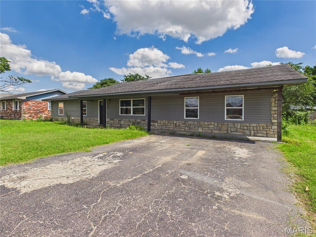 Welcome to 503 Barrett Drive, Malden, MO! This beautifully renovated 4-bedroom, 4.5-bathroom home is brimming with charm and modern conveniences. The expansive open-concept kitchen, dining, and den area provides the perfect space for entertaining or relaxing at home. Thoughtful trim work and custom wooden designs throughout the kitchen and dining area add a unique touch of character, showcasing exceptional craftsmanship best appreciated in person. The kitchen is a chef's dream, featuring a spacious island, a wall oven, and additional major appliances included. A versatile bonus room offers the flexibility to serve as an office or a potential fifth bedroom, with space to accommodate storage needs.  This home features a very unique "Jacuzzi Room", with surround sound and darkness to create the ultimate in-home relaxation oasis.