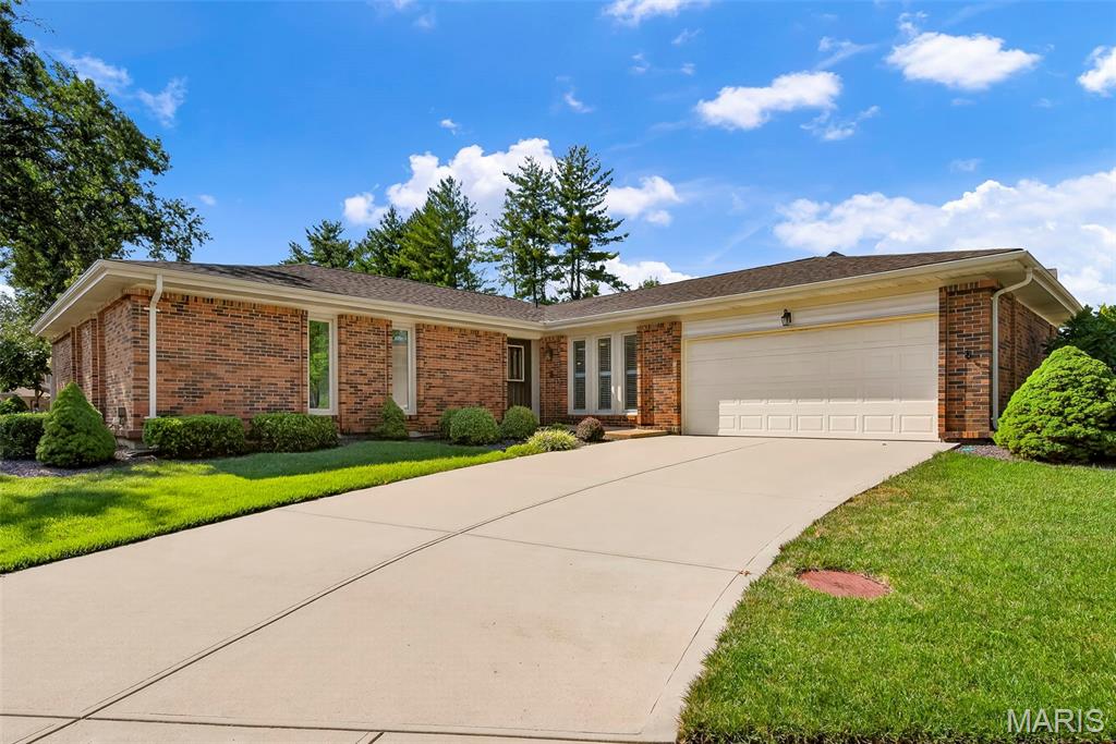 Meticulously updated main floor living home awaits you! This 4 bedroom 3 full bathroom home has an open floor plan w/ some accessible features. Light & bright kitchen has white cabinets, quartz counter tops, sleek tile backsplash, updated appliances, breakfast bar, 2 pantries, & serving bar w/prep sink. Off the kitchen is the main floor laundry room w/ utility sink & built-in cabinetry. Breakfast room is open to the kitchen & great room w/ sliding door to the screened-in porch. Off the porch is a large patio space to enjoy upcoming fall weather. Great room was opened up to make a fantastic open living space with family room seating, hearth room area w/inviting gas fireplace, & counter seating area for 6. Primary suite boasts nice walk-in closet, a remodeled bath w/ double door entry, gentleman height vanities, & step-in shower. 3 additional bedrooms & full bath complete the main level. Lower level has a finished office space w/ a full bath. 2nd laundry area & wet sink are located in the LL. There is so much space. You have room for a game area, workshop, & tons of storage without choosing one. Upgrades Include: in-ground sprinkler system, landscape lighting, newer HVAC & water heater, newer roof, newer windows & doors, plantation shutters, newer vented gas logs, oversized garage w/ epoxy floor coating,  smart wiring for lighting in the home. Additional Features: 36 inch wide hallways, accessible living spaces, one-step entry w/ possibility of a ramp, & accessible primary bathroom entry.