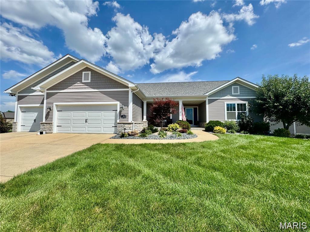 Beautifully updated 5 bed, 4 bath home nestled in the heart of O'Fallon. Situated in a quiet neighborhood, this home offers the perfect blend of comfort, style & convenience. Step inside to discover an open-concept floor plan featuring vaulted ceilings, rich hardwood floors, and abundant natural light. The spacious living room flows seamlessly into the dining area and kitchen—ideal for entertaining. The kitchen boasts stainless steel appliances, ample cabinet space, and a breakfast bar for casual dining. The main-floor primary suite features a DREAM of a walk-in closet and private en-suite with dual vanities. Two additional bedrooms, full bath & half bath complete the upper level. Downstairs, the finished basement offers a large family room, two additional bedrooms, full bathroom, a bar area and additional room for storage. Enjoy outdoor living on the back deck overlooking the fully fenced yard. Located within the O'Fallon school district and minutes from Scott AFB, shopping, dining, and I-64 access, this home checks all the boxes for both everyday living. This is a NO SMOKING, PET FRIENDLY home with NONREFUNDABLE pet fee of $400 for 1, $550 for 2 animals. $50 App Fee - credit, criminal and eviction reports ran for applicants 18 years of age and older. ***Home is tenant occupied - showings require 24 hours notice. ***Pets on property.