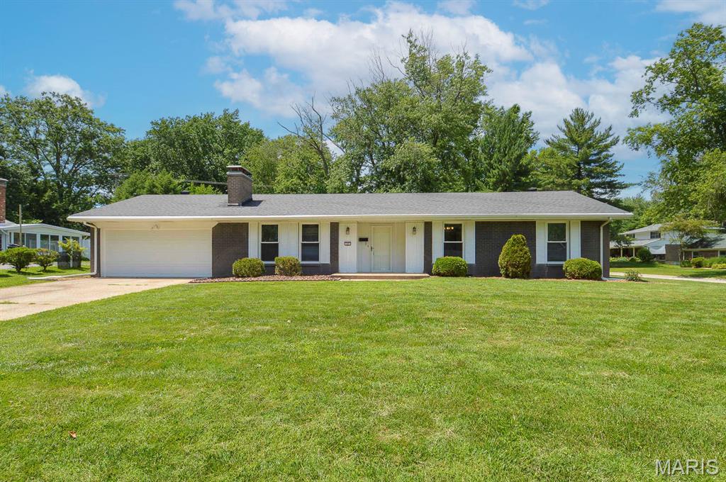 Price listed is Starting Bid Only. Bidding starts closing 10/8/2026 @ 5 p.m. Move-in ready and full of character, this beautifully maintained home sits on a nearly half acre corner lot in the highly sought-after Chenot Place subdivision of Belleville, IL. Freshly painted and recently cleaned carpeting, this home offers comfort, warmth, and functionality throughout. This inviting home features 3 bedrooms and 1.5 baths that have been updated, along with a bright and airy family room highlighted by abundant natural light and a stunning floor-to-ceiling brick wood-burning fireplace complete with built-in wood storage. The kitchen provides space for a small table and includes a built-in double oven, a gas cooktop conveniently positioned across from the refrigerator, sink, and ample cabinet and countertop space. The dining area offers a built-in storage hutch and is open to the living room which offers its own built-in book case, creates an easy flow for everyday living and entertaining, and offers access to the backyard through sliding glass doors. The garage door has recently been replaced while the furnace and A/C are serviced yearly. Property will sell under auction terms and be sold AS- IS, WHERE-IS. Seller, will not make any repairs as a result of any building, occupancy, or environmental inspections. Buyer will be required to sign an Auction Purchase & Sale Agreement if final bid is accepted by Sellers.