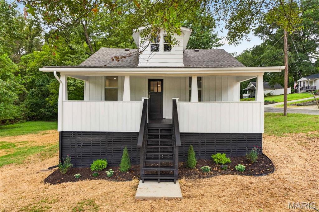 Welcome to this freshly updated raised ranch style home on a wonderfully wooded corner lot.  Your front porch looks over a rolling hill side that usually has deer as regular guests, which moves over to the large side yard that rolls down to a stream and plenty of trees.  As you enter the home the open floor plan flows from front to back with new LVP throughout the entire house. Fresh paint and updated fixtures giving the new owner a blank canvas to make it their own.  Updated tile floor to wall in the bathroom with 2 pocket doors for easy access without cutting off space. Quartz countertops in the kitchen and a large picture window, sharp and clean ready for a freshly cooked meal.  The basement was updated with fresh paint on the ceiling and white walls to give access for any future updates but also give as much height & depth to make it feel more open.  The lower level includes a large bedroom with plenty of natural light, a laundry area with a folding cabinet and a bonus room.  Move fast or someone will move in without you.