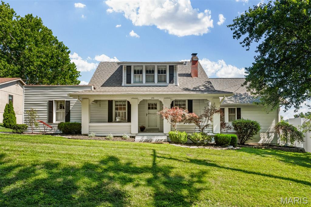 Character and craftsmanship meet modern comfort in this 1925 home, thoughtfully expanded to suit the way today's buyers live. Picture your mornings here: coffee in hand on the covered front porch, watching the neighborhood wake up beneath original Craftsman columns. Step inside and that same character carries through: original woodwork, a wood-burning fireplace anchoring the living room, built-in glass-front display shelves flanking the Dining Room, and warm hardwood floors (including under the living room carpet). The kitchen's dedicated pantry and built-in hutch keep everyone gathered around while dinner comes together.
French doors open into a private guest suite, an oversized bedroom with double closets and its own full bath, ideal for visiting family and friends, or generational living. Upstairs, two additional bedrooms offer generous closets and cozy nooks built for quiet reading or lazy weekend mornings, sharing a hall bath appointed with a clawfoot tub.
The main floor primary suite is a later addition that blends seamlessly with the home's original style, offering an oversized bedroom, a large walk-in closet, and a spa-like bath complete with its own clawfoot tub, the perfect place to unwind after a long day.
Downstairs, a finished lower-level family room adds flexible living space for movie nights or a rainy-day retreat. Outside, the .6-acre lot is made for real life: room for to run, garden, anything your heart desires. Imagine evenings on the rear deck as the sun goes down, and mature trees that make the whole yard feel like its own private escape. Location seals the deal: this home sits within walking distance of Schroeder Park, the Manchester Aquatic Center, and the Manchester Amphitheatre, putting summer swims, concerts, and green space right at your doorstep.  Nearby commuter routes make this one very easy to get wherever you need to get to. Homes with this much character and this much room to live don't come around often. Schedule your private showing today.
