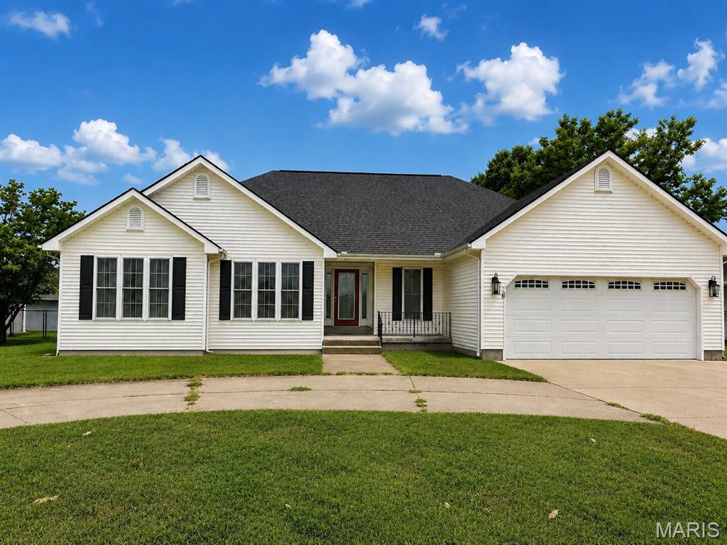 This spacious 4-bedroom, 3.5-bath home offers the perfect combination of comfort, functionality, and room to grow. The main level features 3 bedrooms, 2 full bathrooms, an inviting living room with vaulted ceilings, and a well-appointed kitchen with abundant cabinetry, generous counter space, and an open layout that's perfect for everyday living and entertaining. Just off the main living area, you'll find a bright sunroom, providing the perfect spot to enjoy your morning coffee or unwind at the end of the day.

The fully finished basement adds incredible versatility with an additional bedroom, 1 full bathroom and 1 half bathroom, a dedicated office or flex space, and a large family room that could easily serve as a media room, game room, playroom, or home gym.

Outside, the home is equally impressive with a new roof, attached two-car garage, and a detached outbuilding with a garage door, offering plenty of space for storage, hobbies, lawn equipment, or a workshop.

With over two levels of thoughtfully designed living space and flexible rooms to fit your lifestyle, this home is ready for its next owners. Don't miss your opportunity to make this exceptional property your own!