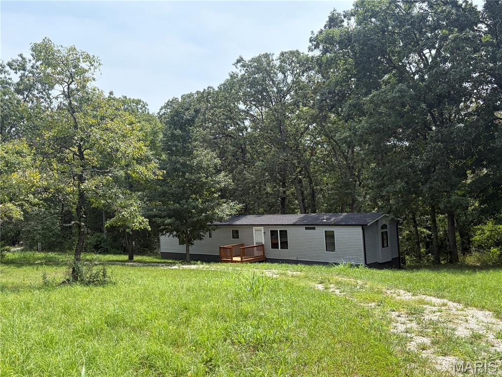 Welcome home to this beautifully updated 2-bedroom 2-bath home in Union with woods directly behind the property. So much has already been done to make this home move-in ready including updates to the HVAC, appliances, windows, electrical, hot water tank, paint, flooring, plumbing, bathrooms, siding and underpinning. Both the front and rear decks have also been updated and the roof is only about 5 years old. Enjoy a comfortable layout with two full bathrooms and a peaceful wooded setting. Come take a look and see all this home has to offer!