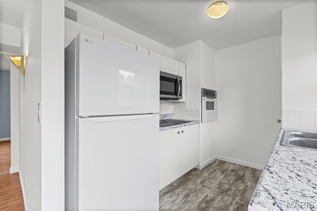 Paddock Forest Condo - Residential