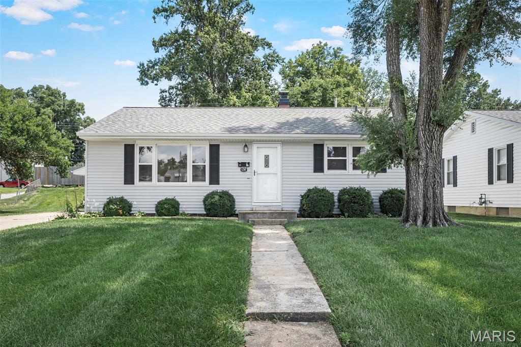 Beautifully UPDATED and meticulously maintained ranch nestled in one of St. Charles' most charming and established neighborhoods! Perfectly situated on a spacious corner lot with convenient side-entry access, this move-in-ready home seamlessly blends timeless character with today's modern finishes.
Inside, you'll be welcomed by original refinished hardwood floors, FRESH paint, NEW lighting, rich original woodwork, generous windows that fill the home with natural light, and spacious rooms designed for comfortable living. The stunning NEW custom kitchen has been completely renovated with NEW solid-wood soft-close cabinetry, and a full suite of NEW stainless-steel appliances, creating the perfect space for everyday living and entertaining.
The inviting living area flows into a charming sunroom through original wood French doors, offering the perfect spot to relax with your morning coffee or unwind at the end of the day. Main-floor laundry hookups add everyday convenience.
The full unfinished basement is freshly painted and provides outstanding additional laundry hook-ups, storage or endless opportunities to create additional living space tailored to your needs.
Outside, you'll appreciate the private deck, oversized detached one-car garage with automatic opener, additional storage shed, and the generous corner lot offering exceptional curb appeal.
Thoughtfully updated for peace of mind, this home features a newer roof approximately two years old, newer windows, and a NEW water heater.
Ideally located just minutes from Historic Main Street St. Charles, Lindenwood University, parks, shopping, dining, and convenient access to Highways 70 and 364. Do not miss this exceptional home offering the perfect combination of charm, quality, location, and lifestyle. Agent Owned. Simply move in and enjoy!