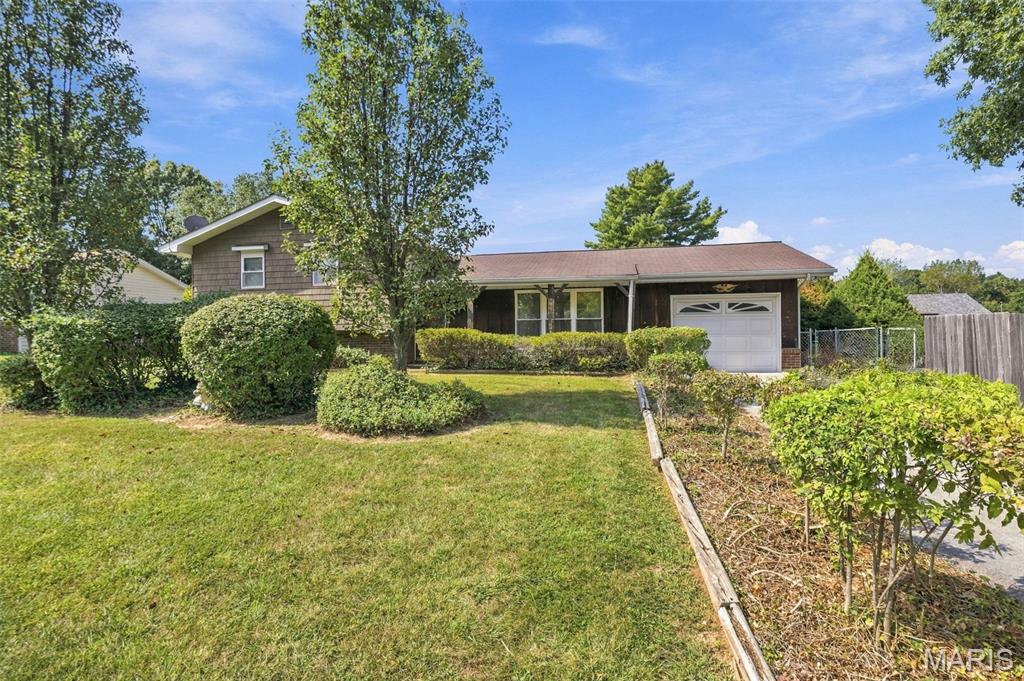Welcome to this 3-bedroom, 2-bath split-level home nestled in a small Imperial neighborhood within the Fox School District. With a partially finished basement and a spacious double lot, this property offers a unique combination of living space, yard space, and potential that is hard to find in the neighborhood.

The home is livable and ready for its next owner, while offering plenty of opportunity to add your own personal touches and updates throughout. The partially finished lower level provides additional flexible space for a family room, recreation area, home office, or storage.

One of the standout features of this property is the rare double lot, providing an expansive outdoor area with room to enjoy, entertain, or create your own backyard oasis. The additional lot includes a pool house and an in-ground pool. The pool has been filled in with dirt and will require substantial work if a future owner chooses to restore it, but the existing pool house and outdoor space offer plenty of potential.

Conveniently located in Imperial and within the Fox School District, this property is a great opportunity for someone looking for a home with a larger-than-usual lot and the chance to make it their own.  Come take a look today.