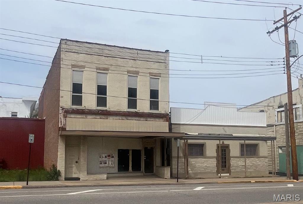 Two parcels sold together (23-2-07-14-08-203-008 & 23-2-07-14-08-203-008.001)  .....  528 E. Broadway, Alton – This one story warehouse building has 4,037 square feet, Lot Size = 60 x 113 & Taxes = $771 annually.  Has a nice setback from a busy section of Broadway across from many events in Alton’s Riverfront.  The large area out front could be used for extra parking, patio space or possibly a garden center.  New insulated TPO roof and then a 5,000 ft. exposed courtyard enclosed in the rear.  This building is located in the Alton Tiff District.
538 E. Broadway, Alton – This two story masonry structure has 3,354 square feet, Lot Size = 28 x 113 & Taxes = $770 annually.  Has new insulated TPO roof.  Building has been completely gutted and is ready for a new build out.  Full basement with concrete floor.  First floor has new plywood subfloor.  Second floor is gutted to the studs and can be built out as mixed use residential more commercial space.  Excellent Broadway location across from the pedestrian bridge that enters the amphitheater.  This is located in the Alton Tiff District.