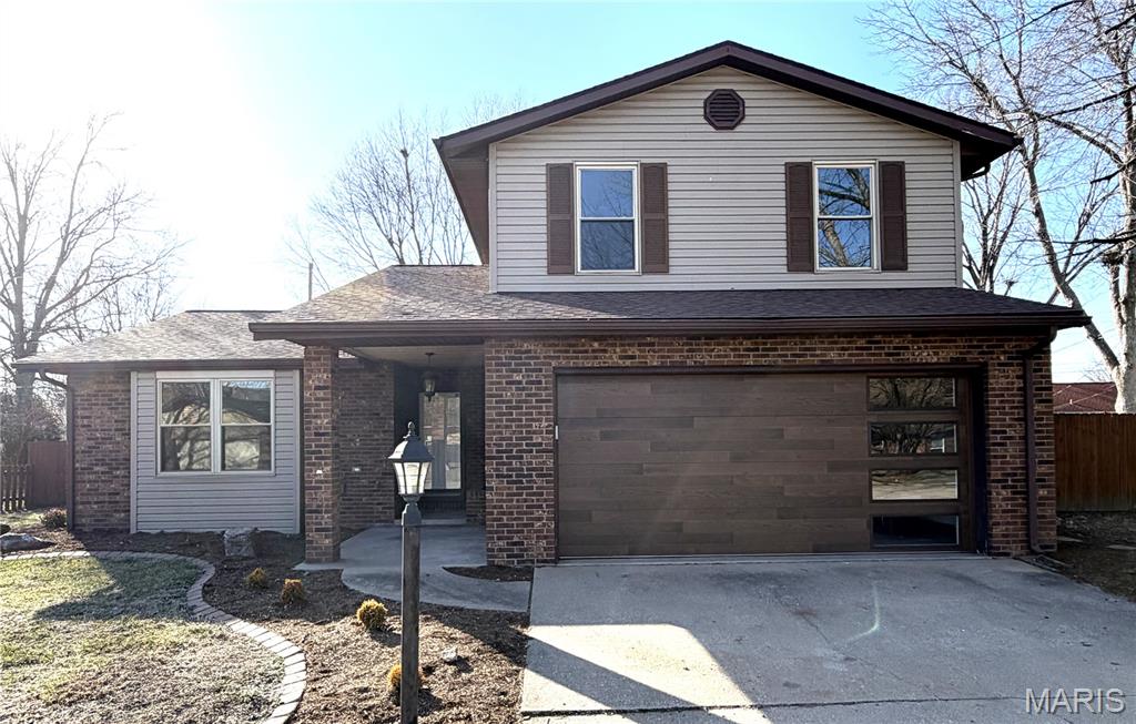 Beautifully renovated 1.5-story home located in the desirable Wolf Branch School District. This 3-bedroom, 2-bath residence offers a 2-car attached garage and a covered back porch, combining comfort and functionality. The updated kitchen features new soft-close cabinetry, quartz countertops, tile backsplash, updated sink and faucet, and Whirlpool appliances. The main level includes a separate living room with fireplace and an additional family room, providing versatile living space. Upstairs, you’ll find three bedrooms, a full bath, and a conveniently located laundry area. Recent improvements include updated light fixtures, receptacles, switches, water heater, and an upgraded garage door. The interior has been freshly painted. All flooring is new except baths. Enjoy outdoor living on the covered patio with an additional deck—ideal for entertaining.