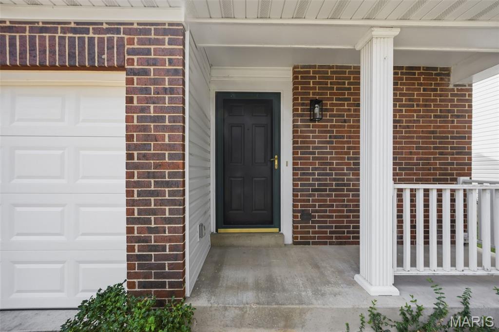 Welcome home to this beautifully updated, light-filled condo in the heart of Valley Park, conveniently located near shopping, dining, and medical facilities. Tucked away on a quiet street, this two-story home offers comfortable living with all the amenities you need. This charmer has been completely updated and features a new roof and Siding.

You’ll be greeted by off-street parking and a one-car driveway leading to an extra-deep, one-car garage. As you make your way to the front door, you’ll enjoy the covered front porch—perfect for sipping your morning coffee or listening to the rain.

Step inside to a spacious, open living and dining area featuring high ceilings and abundant natural light from the vinyl windows. The home has been thoughtfully updated with fresh paint, new light fixtures, and extremely durable luxury vinyl plank flooring throughout.

Off the dining area, the kitchen features new stainless steel appliances, granite countertops, and plenty of space for cooking.

Upstairs, an open loft area provides the perfect flex space for a second living area, home office, or guest space. At the top of the stairs, you’ll find a fully remodeled bathroom featuring luxury vinyl plank flooring, a new vanity and lighting, and a beautifully updated tile shower/tub combination.

Continue down the hall to find a spacious laundry room conveniently located near the loft and two generously sized bedrooms. The primary suite features soaring ceilings and a newly renovated private bathroom. The second bedroom is equally spacious, filled with natural light, and positioned toward the back of the home for added privacy.

The large, unfinished basement provides ample storage space and room for a home gym, workshop, or future finished living area. Additional updates include a brand-new water heater, a sump pit in the basement, and a newer furnace.

With thoughtful updates, flexible living spaces, and a convenient Valley Park location, this home is move-in ready and waiting for you!