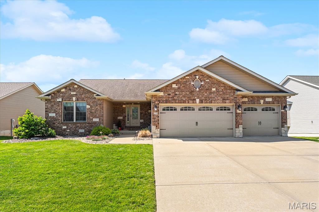 Looking for space, comfort, and style; you must see this stunning 4-bedroom, 3-bathroom home. The spacious open concept living and dining area features amazing hand scraped red oak hardwood floors. The three main level bedrooms all feature brand new carpeting, and the primary bath has a fully tiled walk-in shower. In the finished basement you will find more entertaining space, a fourth bedroom, a third bathroom, and a large storage room. The backyard is ideal for relaxing or hosting gatherings on not only the large deck but also the paved patio. And don't worry, all your yard tools can be conveniently stored in the enclosed shed space under the deck. The three-car garage has plenty of storage space and a workbench area. This home offers the perfect blend of comfort and functionality!