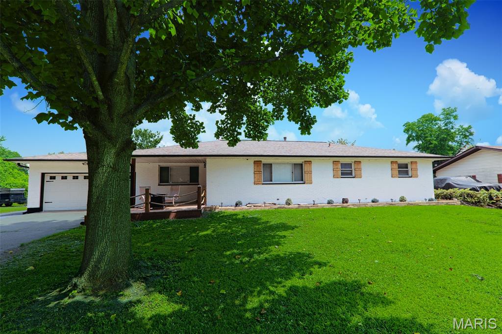 Welcome home to this beautifully remodeled 4-bedroom, 2-bath lakefront property that perfectly blends modern updates with peaceful waterfront living! Situated on a spacious double lot, this move-in-ready home has been completely remodeled from top to bottom, offering stylish finishes and comfortable living throughout.  The finished basement features a non-conforming bedroom that also makes an ideal home office, workout room, or hobby space giving you the flexibility to fit your lifestyle. Step outside and enjoy your own slice of paradise! Whether you love fishing, kayaking, or simply relaxing by the water, this scenic lakefront setting provides endless opportunities for outdoor enjoyment. Car enthusiasts, hobbyists, and those needing extra storage will appreciate the oversized garage space, featuring both a 2-car attached garage and an additional 2-car detached garage.  With its extensive updates, generous living space, incredible garage capacity, and beautiful waterfront location, this one-of-a-kind property offers everything you’ve been searching for. Don’t miss your opportunity to own this stunning lakefront retreat! Home furnishings are negotiable.  Buyers and buyers agent to verify all information in the MLS including sq ft, taxes, features, and schools.  Agent owned.