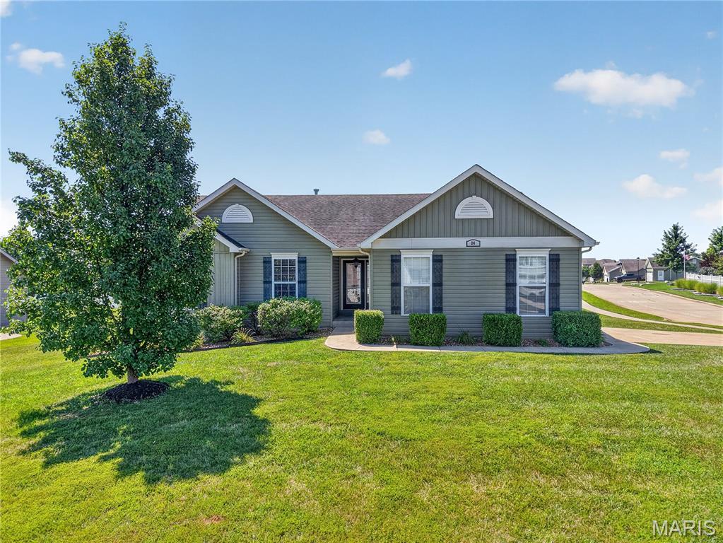 Impressive 3 bedroom, 2 bath ranch in the desirable Austin Oaks neighborhood!  This charming and beautifully maintained home sits on a corner, .29 acre, level lot and has a side entry, 2 car garage.  The curb appeal is impressive with board and batten siding, enclosed fascia/soffits, full glass front door, architectural shingles, carriage style garage doors and garage coach lights.  Features include laminate flooring throughout the main (except bathrooms). Vaulted ceiling in the Entry-Great Room-Breakfast Room-Kitchen, contemporary cable style railing at the stairs to the lower level, an open floor plan, staggered height Kitchen cabinets with crown, stainless steel appliances, smooth top range, microwave, dishwasher, breakfast bar, Breakfast Room with sliding door to the patio, walk in closet in the Primary Bedroom, double bowl vanity and shower in the Primary Bathroom, main floor laundry, ceiling fans, 2 panel doors, 50 gallon water heater and more.  There are added 110v outlets and a 220v outlet in the garage and the doors, trim, Kitchen and hallway have been freshly painted.  The stove is newer (2023) as is the microwave (2026). The lower level has a rough in bath and an egress window for an easy future finish if desired.  There is a neighborhood pond and playground just a short walk away.  1,340 sq ft of amazing living space.  Put this on your must-see list!
