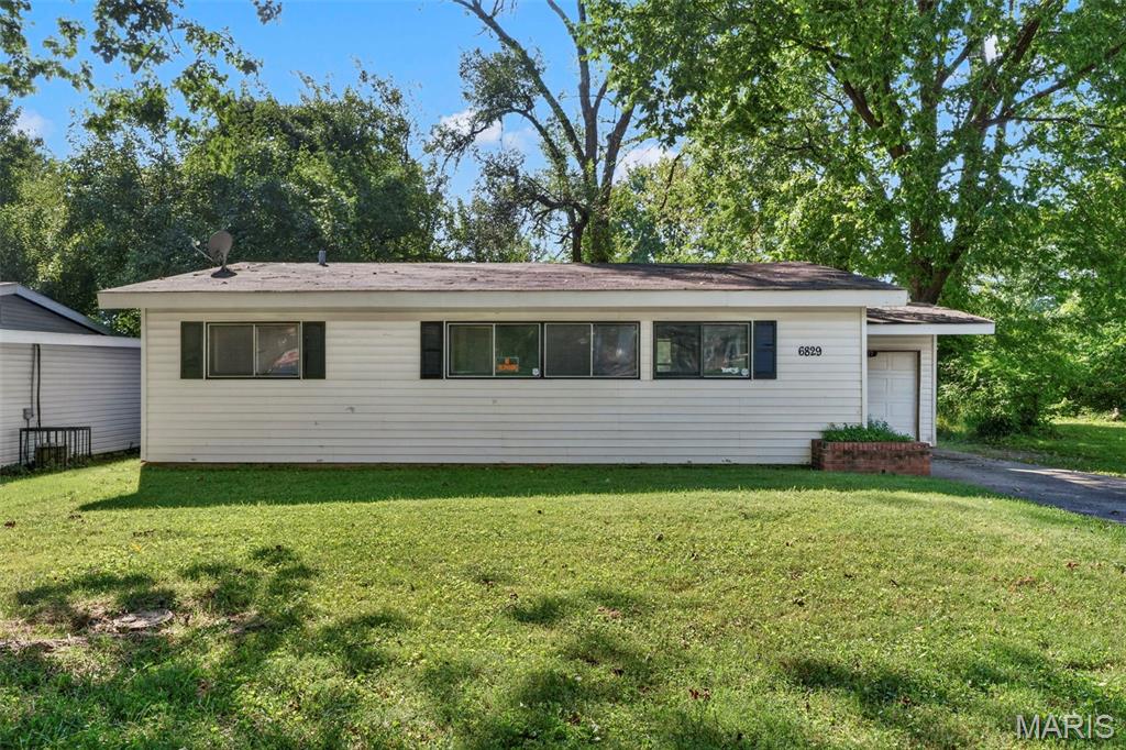Great opportunity for an owner-occupant or investor! This 3-bedroom, 1-bathroom home has been fully cleaned out and is ready for its next owner. The property features white vinyl siding, a large level lot, and a 1-car attached garage. Major mechanical updates include a replacement electrical panel and furnace/AC system, completed within the last 5 years. The home offers a solid opportunity to renovate and make it your own or add it to your investment portfolio.