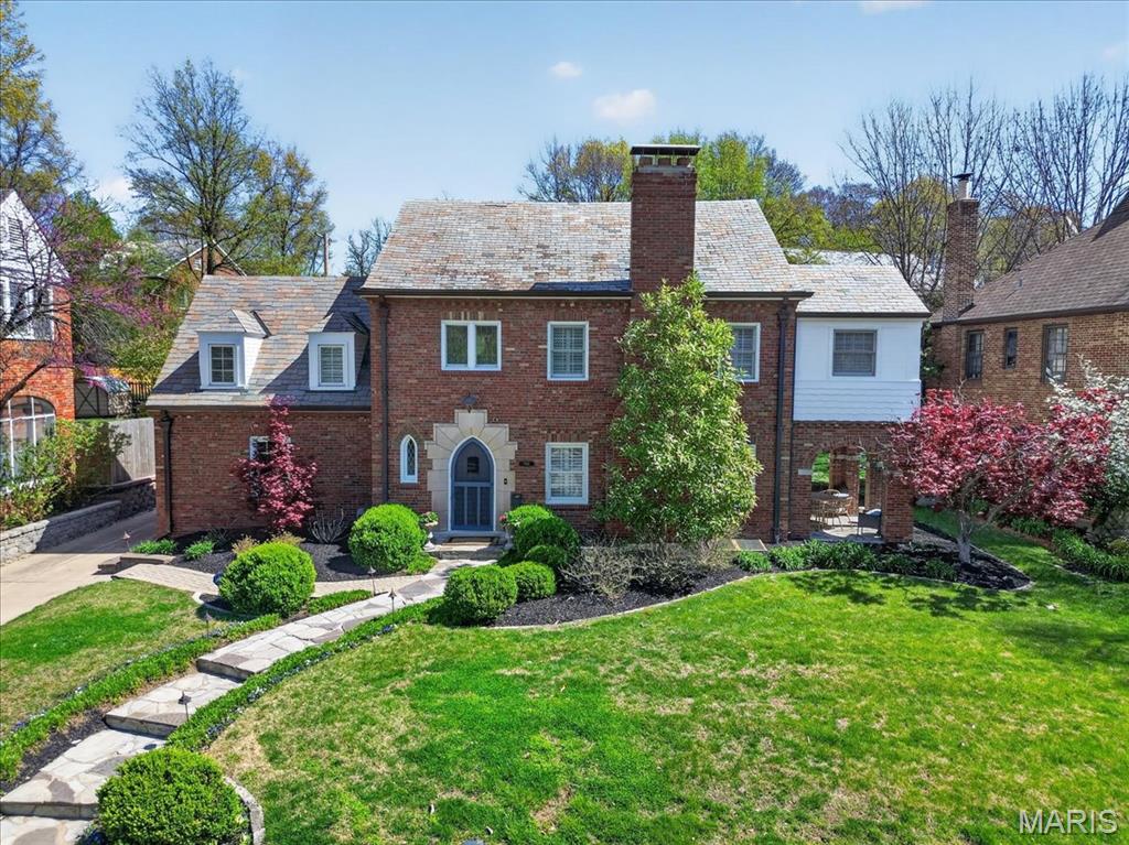 Beautifully updated 4-bedroom, 3.5-bath home in a highly sought-after Clayton neighborhood, just moments from Meramec Elementary. This inviting home features a wonderful floor plan with gracious living spaces. Numerous updates throughout provide modern comfort and style, while maintaining timeless appeal. The beautifully updated kitchen, featuring Sub-Zero, Thermador, and Bosch appliances, opens seamlessly to the formal dining room-currently enjoyed as a casual dining space and playroom. The original attached garage has been thoughtfully transformed into a fantastic family room with custom built-ins, bar sink, wine refrigerator, and additional beverage fridge-perfect for entertaining. The refinished lower level offers exceptional flexibility with space for a rec room, office or guest bedroom, complemented by a large full bath, walk-in cedar closet, and extra storage. Upstairs, you’ll find 4 bedrooms and 2 full baths, including a spacious primary suite with a large walk-in closet and an ensuite bath featuring double sinks and a steam shower. A convenient second-floor full-size laundry area adds everyday ease. The lovely patio, level yard and two-car detached garage are extra bonuses. This move in ready home is a rare opportunity in an exceptional location- don't miss it!
Sellers’ updates include new copper gutters, new HVAC system with rearchitected ductwork, exterior painting and landscaping. Additionally, in the lower level, the sellers replaced the stairs, added bookshelves, a large cedar closet and new flooring plus Hydroseal and a sump pump. Showings bein Thursday April 16, 2026