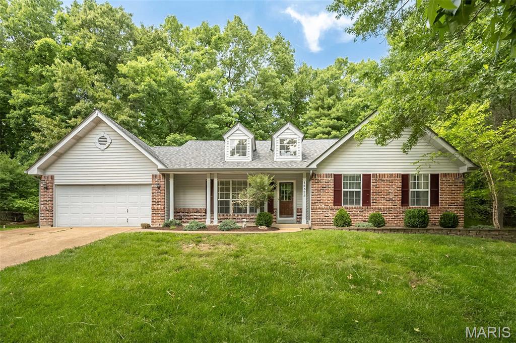 Nestled at the end of a quiet cul-de-sac in the heart of Wildwood, this beautifully maintained ranch offers the perfect blend of open-concept living, privacy, and everyday comfort. Soaring vaulted ceilings, rich hardwood floors, and abundant natural light create an inviting atmosphere from the moment you step inside!

The spacious great room is anchored by a stunning brick fireplace and flows seamlessly into the updated kitchen featuring granite countertops, abundant cabinetry, breakfast bar seating, and an adjoining breakfast room overlooking the backyard. A formal dining room provides additional space for entertaining, while the versatile front sitting room makes an ideal home office, sitting room, or library.

The primary suite offers a peaceful retreat with a walk-in closet and updated bath complete with skylight, dual vanities, soaking tub, and separate shower. Two additional bedrooms and a full hall bath complete the main level.

Downstairs, the finished lower level dramatically expands the living space by over 1000+sf with an enormous recreation area, wet bar, half bath, and plenty of room for movie nights, game tables, hobbies, or hosting guests.

Step outside to discover one of this home's most special features—a private, tree-lined backyard oasis. The expansive paver patio, firepit area, hot tub, and mature wooded backdrop create the perfect setting for relaxing evenings and weekend gatherings. 

Thoughtfully maintained and updated, major improvements include a new roof and HVAC system installed in 2022, offering peace of mind for years to come. Hot Tub was professionally cleaned June 2026. 

Located in the highly sought-after Lafayette School District and offering a quick closing opportunity, this sprawling ranch delivers the space, setting, and lifestyle you deserve!