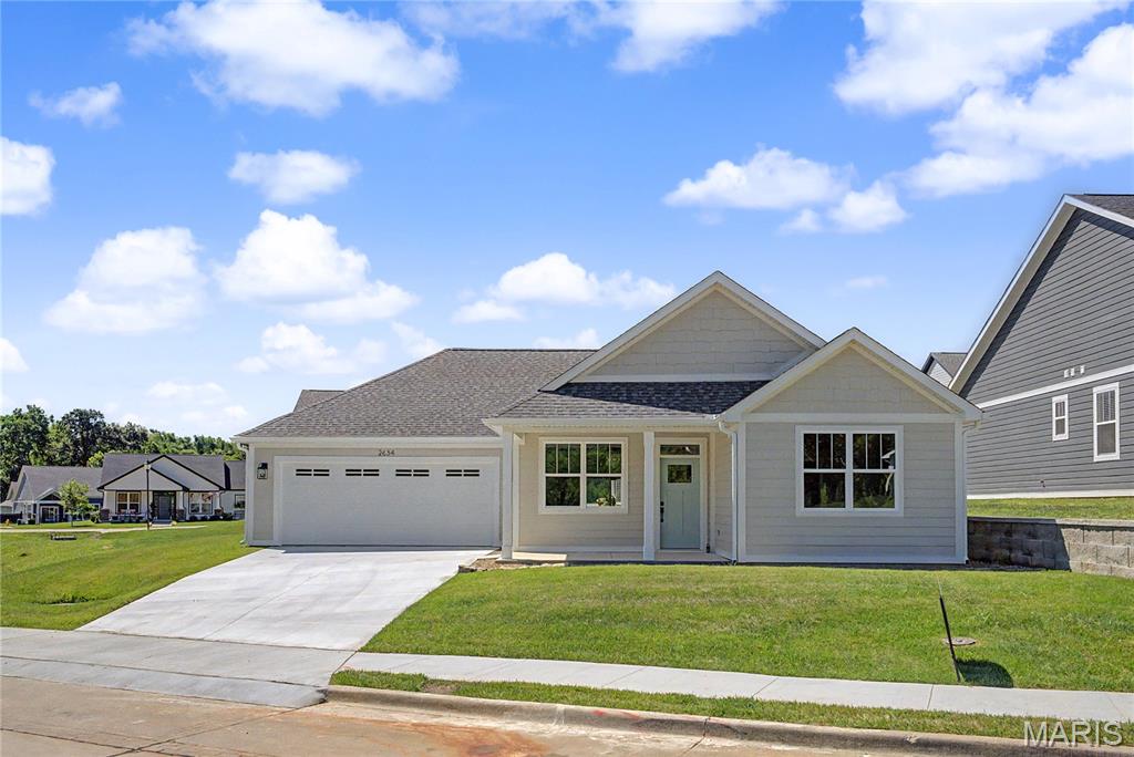Welcome to effortless living in this beautiful 2-bedroom, 2-bathroom slab home located in Cape Girardeau’s highly desirable Walden Park
neighborhood. The open-concept floor plan features a bright living area that flows perfectly into a kitchen where, if you act quickly, you can still
hand-pick your own custom countertops! Step outside to relax or entertain on your private covered back patio, perfectly extending your living
space outdoors. Offering a spacious primary suite, a versatile second bedroom, and access to fantastic community walking trails, this low maintenance home truly has it all. Don’t miss your unique opportunity to customize the finishing touches and make this absolute gem your own!