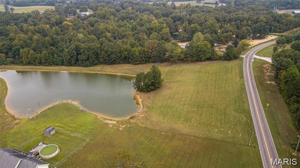 Beautiful building lots in south Butler County.  Less than ten minutes from US 67 and minutes from Poplar Bluff or Neelyville yet seems like miles from traffic.  Desirable Neelyville school district and less than 10 minutes from Hillview School.  Neatly platted subdivision where all lots are over an acre (+/-) to give each family plenty of room but with the security and friendship of a neighborhood.  2 ponds located in the subdivision add to the bucolic picture.  Public water and electric available.