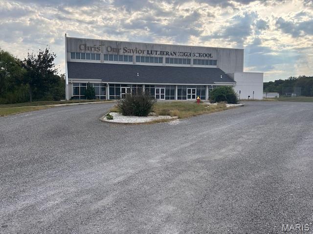 If you're looking for a property that balances size, functionality & long term opportunity, this 20+ acre campus is an A+ investment with unlimited possibilities.Gym is a 1.5 sty multipurpose bldg that accomodates athletics, events, recreation, or redevelopment into a wide range of functional spaces. Main School bldg is 1sty facility, featuring an office & 6 classrooms that can easily be converted into offices,training facilities or community space. Lots   of parking  & outdoor recreation.
