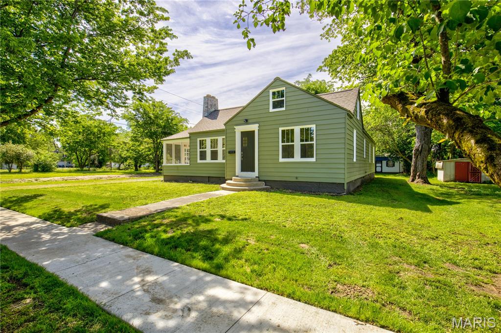 Welcome to this newly renovated 1937 bungalow where you will be greeted with a balance of historic charm and modern updates. Relax and enjoy your coffee on the screened porch right off the cozy living room that features a gas fireplace and plenty of natural light. The formal dining area is conveniently located between the living space and kitchen, which has ample storage in addition to the new appliances (dishwasher, range and microwave). Beyond the kitchen is a flex space ideal for a mud-room as you enter from the back of the home. This three-bedroom one-bath home includes a second flex space upstairs for extra storage, a bedroom, office, playroom, you name it. In the midst of bad weather, you can rest easy knowing you have your own storm shelter accessible from inside your home, which can serve as additional storage. 
Don't miss out on making this yours!
