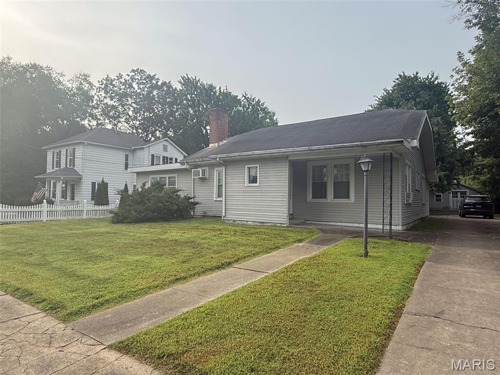 This spacious 4-bedroom, 2-bath home offers 2,749 sq. ft. of living space on a 0.29-acre lot with plenty of room inside and out. The home features generous room sizes, charming built-ins, a gas fireplace, and a large kitchen with an abundance of cabinetry and counter space. The primary bedroom is highlighted by an impressive 10x15 walk-in closet complete with built-in shelving and storage. Additional features include plenty of storage throughout, a concrete driveway, attached carport located behind the home, a large patio area, and a nice backyard. With spacious living areas, great storage, lots of natural light, and plenty of character, this home has a lot to offer its next owner.