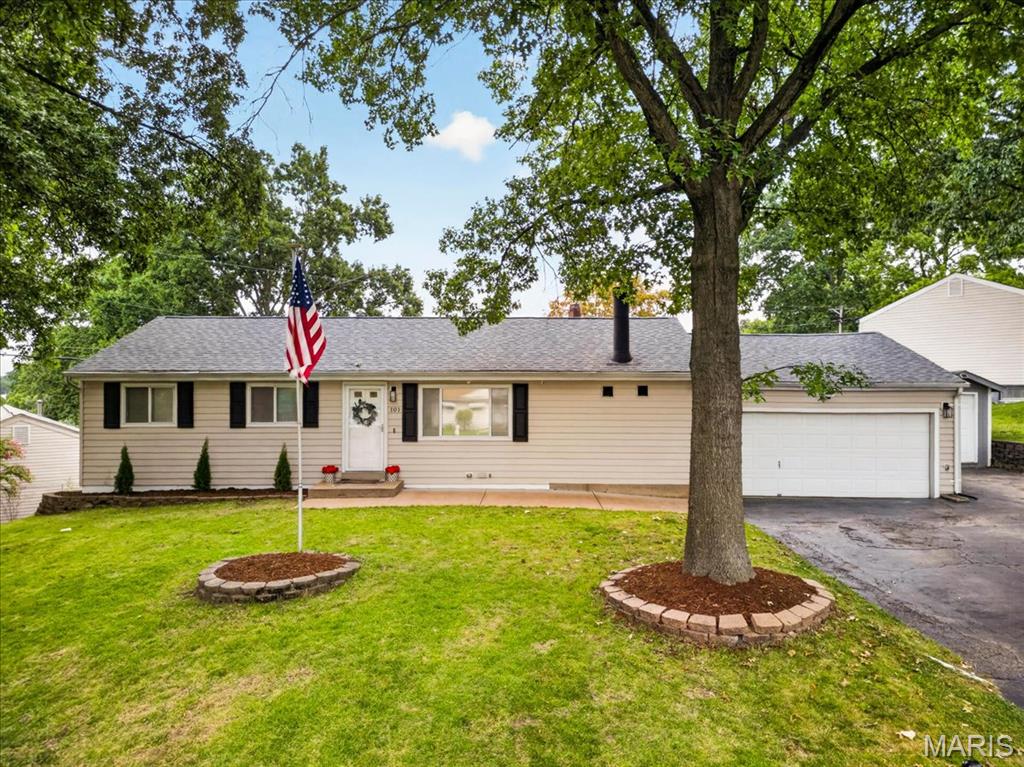 Welcome to this beautifully updated ranch, tucked along a charming street and filled with thoughtful upgrades throughout. The inviting family room features a cozy wood-burning fireplace, while French doors fill the space with natural light and open to a spacious covered patio—perfect for relaxing or entertaining. Sleek LVP flooring flows into the bright, updated kitchen featuring custom cabinetry, stainless steel appliances, and a built-in pantry. A separate dining room provides the perfect setting for everyday meals or hosting family and friends. Three spacious bedrooms, an updated full bath, and a convenient half bath complete the main level. Downstairs, the partially finished lower level offers even more room to spread out with a family or recreation area, an additional full bath, and a flexible bonus space ready to become a home office, playroom, workout space, or private retreat, plus plenty of storage. The thoughtful upgrades continue with a whole-house generator and a heated, attached two-car garage, along with an additional parking pad for a third vehicle. Outside, the fully fenced backyard offers plenty of space to enjoy, complete with a storage shed, fire pit, and covered patio for quiet evenings or weekend gatherings. Conveniently located just minutes from highways, shopping, and everyday amenities, this move-in-ready home offers the perfect combination of comfort, character, and functionality.