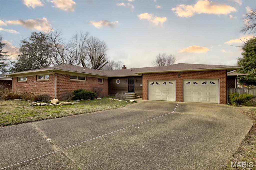 Spacious 4,000+ sq ft home on a quiet circle street in Sikeston! This well-built property offers incredible space for living, entertaining, and relaxing both inside and out.

The home features large, light-filled living areas and two fireplaces, creating a warm and inviting atmosphere perfect for everyday living or hosting family and friends.

A standout feature of this property is the additional in-laws suite with its own living area, hot tub, second kitchen, and bathroom, making it ideal for entertaining, hosting guests, or creating a private retreat within the home.

Step outside into your own private backyard with a nice patio area, perfect for summer gatherings, parties, or relaxing evenings outdoors.

The property also includes a large garage with ample space for vehicles or storage.

Located in a desirable area of Sikeston, this home offers space, comfort, and versatility—a rare opportunity for anyone looking for room to live, entertain, and enjoy.

Schedule your showing today and see everything this impressive home has to offer!