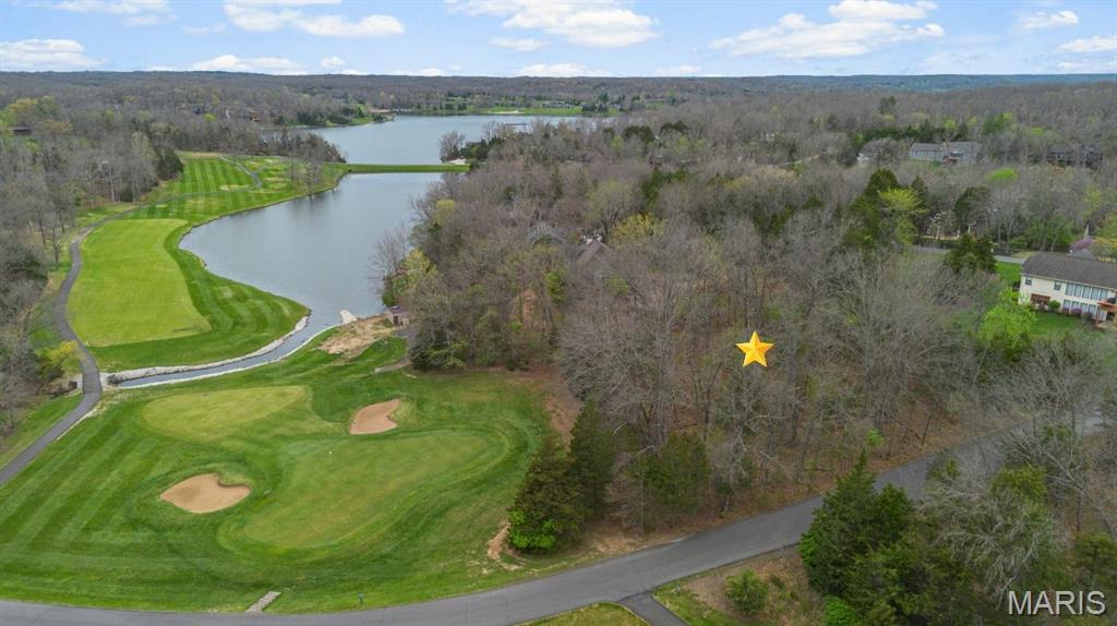 One of the last remaining opportunities in Innsbrook Resort to bring your own builder! Set on nearly one acre, this heavily wooded homesite backs to the 13th hole of Innsbrook’s championship golf course, creating a peaceful, east-facing backdrop framed by mature trees and natural beauty. The gentle terrain lends itself perfectly to a walk-out design. Ideally located near the front gate for convenience, Lot 504 places you just minutes from amenities while still offering a quiet, tucked-away feel. Whether you’re envisioning a refined weekend retreat or a full-time residence, this is a truly rare chance to build and fully embrace the year-round lifestyle that makes Innsbrook so exceptional. With over 100 scenic lakes for kayaking, paddleboarding, fishing, and quiet waterfront relaxation, plus miles of hiking trails, the community is designed for those who value both recreation and tranquility. Residents can enjoy a full-service golf experience, multiple pools, along with pickleball, tennis, and outdoor recreation areas. The amenities continue with a clubhouse restaurant, poolside dining, cafe, and market. An equestrian center adds a unique touch rarely found in the region, while seasonal concerts, festivals, fireworks, and family programming foster a vibrant, welcoming atmosphere. All of this is set within a gated community, offering both privacy and peace of mind.