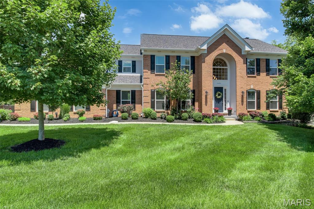 Elegantly updated 2-STY in sought-after Highlands Subdivision! Situated on a private .51-acre lot, the resort-style backyard features a custom Pebble Sheen saltwater pool w/waterfall, luxury hot tub, Kool Deck surround, Veka Lifetime deck, prof landscaping, irrigation system, landscape lighting & 3-zone Bluetooth sound system. Renovated kitchen showcases Cambria quartz countertops, custom 42" cabinetry, center island, breakfast rm, bistro counter & SS appliances. Light-filled sunroom overlooks the backyard oasis.  Vaulted primary suite offers dual CA Closets & spa-like bath w/soaking tub, tiled shower & dbl vanities. Three add'l upper-level BRs each enjoy access to an updated baths. Finished W/O LL includes 5th BR, full BA, rec rm, wet bar & exercise rm. Add'l updates include new roof & siding (2026), hardwood floors, updated staircases, custom fireplace surround, new electrical panel w/surge protection, EV charger, security system, Blink cameras & custom CA Closets throughout including pantry, laundry & mudroom, freshly painted. Move-in ready!
