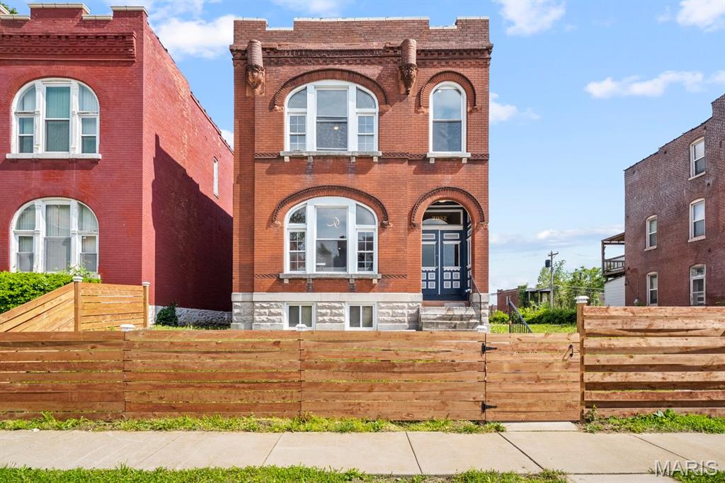 Welcome to 2032 E. Adelaide Avenue. This is a completely renovated beautiful two-story brick home offering approximately 2,244 square feet of spacious living. This impressive residence features three bedrooms, one full bathroom, and a convenient main-level half bath. Step inside to an inviting floor plan with generous living and dining areas, attractive finishes, and abundant natural light. The updated kitchen provides ample cabinetry and workspace, making it ideal for everyday meals and entertaining. Additional highlights include central air, forced-air heating, built-in blue-tooth speaker system, full basement offering excellent storage potential, off-street parking, and a deep backyard. The sale also includes the full adjoining lot to the south, 2034 E. Adelaide, (extra land, future potential). This property offers the enduring character of an 1894 St. Louis home thoughtfully refreshed for modern living. Conveniently located near O’Fallon Park and Interstate 70. Schedule your private showing today and discover everything this distinctive home has to offer!