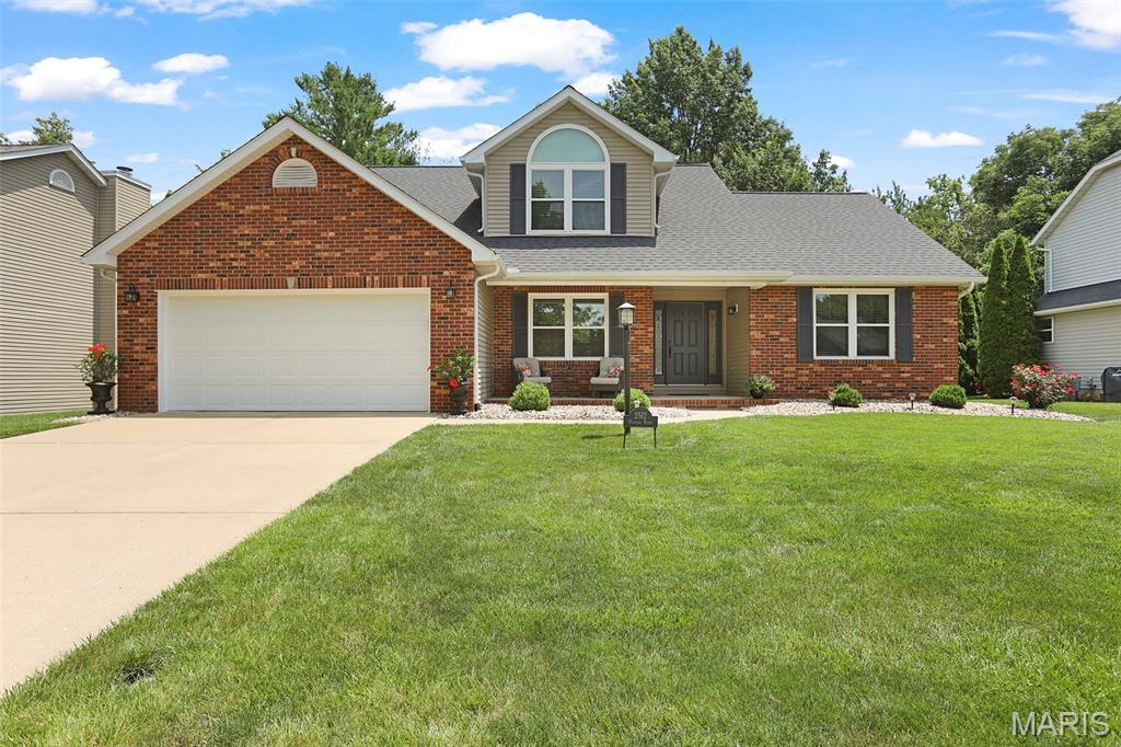 Meticulously maintained & practically made new again, this beautifully updated Hunters Pointe 1.5-story is ready to impress. Light, luxury SPC flooring flows throughout the main level, where a soaring vaulted great room with cozy fireplace creates the perfect backdrop for quiet evenings & memorable get-togethers. The stunning reimagined kitchen features quartz counters, a spacious center island, updated cabinetry accented by champagne bronze hardware, stainless appliances, a vented range hood & designer lighting - delivering effortless everyday living with style. The main-floor owner's suite provides a customized walk-in closet & spa-like bath offering dual vanities, free-standing soaking tub & tiled walk-in shower. A formal dining/sitting/office area, ½ bath & laundry room complete the main level. Upstairs, 2 bedrooms & a full bath provide comfortable accommodations. The finished lower level offers flexibility with a spacious rec area with wet bar, 3/4 bath & bonus room ideal for a home office, gym/hobby space. Step outside to the refreshed deck overlooking a private, partially shaded backyard enclosed by a vinyl privacy fence with no neighbors immediately behind; an inviting setting for morning coffee or summer BBQs. This home offers the best of both worlds - a quiet, established neighborhood with the convenience of shopping & dining just a short walk away. Thoughtfully updated with
 fresh finishes throughout, this exceptional home offers the feel of new construction without the wait.