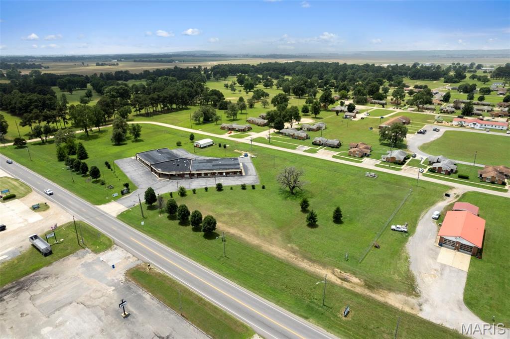 Investment opportunity in Malden, Missouri. The Malden Airport Inn features 28 guest rooms, a lobby/reception area, storage building, and approximately 6 acres with highly visible frontage along Highway 25.

The property is currently undergoing renovations, including new flooring, fresh paint, and updated furnishings. Additional features include ample parking, a fenced area behind the building, and room for future expansion or redevelopment.

Whether you’re looking to continue operating as a motel, develop an extended-stay lodging concept, or explore other income-producing uses, this property offers flexibility, visibility, and acreage rarely found in one package.

Conveniently located with easy access to local businesses, agriculture, and major travel routes throughout Southeast Missouri.