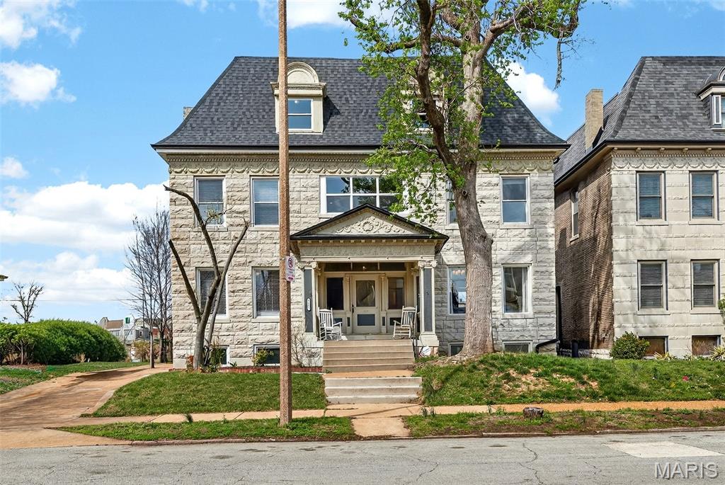 Discover timeless beauty, character, and elegance in this historic residence tucked away on a restricted-access street in the Central West End. This impressive three-story home features more than 4,500 sq feet, and is ideally situated just minutes from Forest Park, Washington University, and Barnes-Jewish Hospital. Built in the early 1900s, it has been thoughtfully renovated to blend classic architectural charm with modern comforts. This is a property you won't want to miss. Relax and unwind while barbecuing on the deck overlooking the backyard. The home offers 5/beds and 3.5/baths, including a luxurious primary suite with walk- in shower, dual vanities, and a custom closet. The second floor provides added convenience with a laundry room and beautifully designed built- in storage. The third floor features three additional generous bedrooms, full bath and ample storage space. Bring your story to life in this beautiful home.