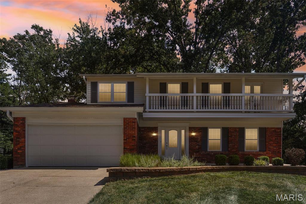 Here is a rare opportunity to own a meticulously maintained, one-owner home in the highly desirable Ballwin area! This spacious 4-bedroom, 3-bath home is hitting the market for the very first time and has been lovingly cared for throughout.
Step inside to an updated kitchen featuring 42-inch cabinetry, solid-surface countertops, and an open layout that flows seamlessly into the living room. Beautiful hardwood floors extend throughout the main level, complemented by a gas fireplace with custom built-in bookshelves. A separate dining room provides the perfect setting for family gatherings and entertaining.
Just off the main living area, enjoy the screened-in porch overlooking a private backyard surrounded by mature trees. Upstairs, you’ll find four generously sized bedrooms, including a spacious primary suite with an updated bathroom and access to a large private porch.
The partially finished lower level offers additional living space with a family room and plenty of room for entertaining, recreation, or future expansion.
Outside, you'll appreciate the fresh landscaping, level backyard backing to trees, and patio perfect for summer and fall BBQs.
Homes like this don't come along often. If you've been waiting all summer for the right home in Ballwin, this could be the one!