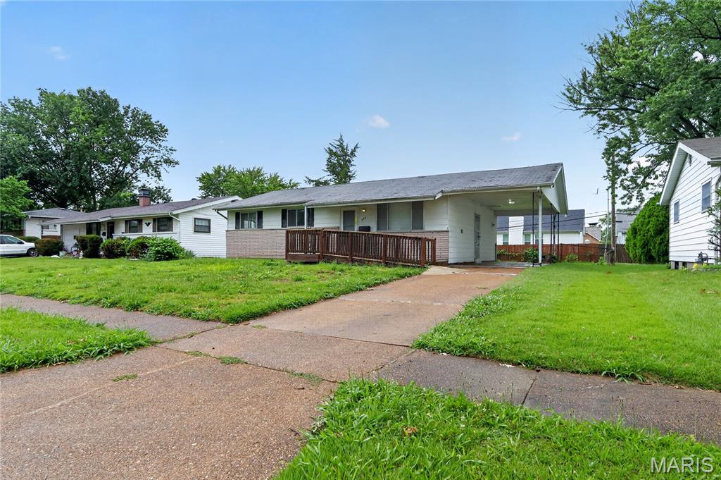 Welcome to this charming Florissant residence offering comfort, convenience, and a functional layout designed for everyday living. Step inside to discover bright and inviting living spaces filled with natural light, creating a warm and welcoming atmosphere throughout. The kitchen provides ample cabinetry and workspace, making meal preparation simple and efficient, while the adjoining dining area is ideal for gatherings and daily meals. Spacious bedrooms offer flexibility for family, guests, or a home office. Outside, enjoy a generous yard with plenty of room for outdoor entertaining, gardening, recreation, or future enhancements. Conveniently located near parks, schools, shopping, dining, and major commuter routes, this property combines neighborhood charm with easy access to local amenities.