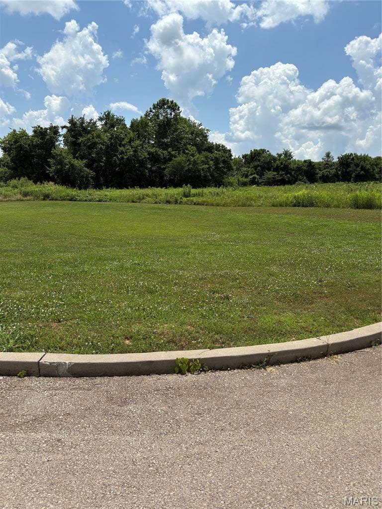 Approximately 3/4 acre commercial lot located directly behind Huddle House and can be seen from Hwy 67. High traffic area with great visibility. Possibilities are endless!