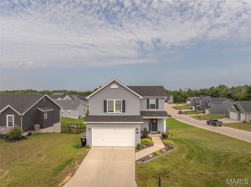 This 3 bedroom, 2.5 bathroom home was built in 2022 and offers the benefits of newer construction with room to grow. Sitting on a .35+/-acre corner lot in the highly sought after Majestic Lakes subdivision, the property has a combined 1,600 square feet between the main level and second story, plus a walkout basement that’s partially finished and ready for your final touches. Inside, the layout is open and functional. The kitchen features granite countertops, modern cabinetry, and an all-electric setup for efficiency. The master suite includes coffered ceilings and a private bath, creating a comfortable retreat. Two additional bedrooms and a second full bath are located upstairs, while a half bath is conveniently placed on the main level. With only three years of age, this home provides peace of mind with newer systems and low maintenance. The corner lot offers extra space and curb appeal, while Majestic Lakes provides access to a community pool and a neighborhood setting that’s welcoming and friendly.