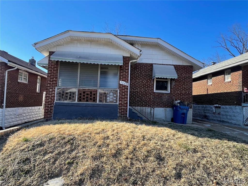 Investors, this one's for you! This brick bungalow offers 1050 sf of living space with 2 bedrooms, 1 bathroom, living room, true dining room, kitchen, bath, full basement, and off-street parking. Inspections are welcome for your knowledge, but the sale is as-is with seller to do no repairs. The roof is brand new, with warranty!  The property is newly rented (April 1) at $1125. Using that figure, gross annual income would be 13,500.  Seller's annual taxes, insurance, and sewer expenses total 2,989; with a pro forma $500 for maintenance, that's an NOI of 10,551, which is a 12.67% cap rate at asking price.  Have a look, make your offer, and let the cash flow begin.