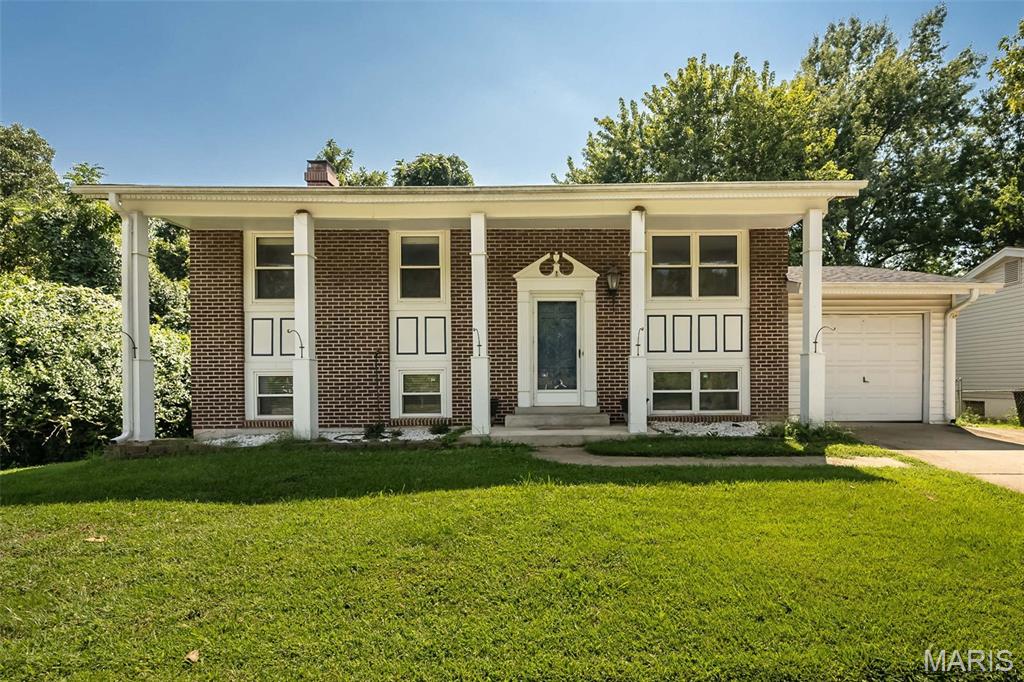 Opportunity awaits in this spacious 4-bedroom, 2-bath home located in the highly regarded AAA Rockwood School District. Perfect for an Investor or Rehabber in a sought after area in Fenton! This home offers a versatile split-level floor plan, this home features laminate wood flooring throughout much of the main level, generous living and dining spaces, and an eat-in kitchen with abundant cabinetry and exterior French doors. The main floor also has 3 bedrooms and a full bathroom.  The lower level expands the living space with a large family room highlighted by a classic brick fireplace, a 4th bedroom, full bathroom, plus unfinished space for laundry, storage, or future possibilities. Outside, enjoy a spacious fenced backyard with mature trees, a patio, and plenty of room for gardening, recreation, pets, or entertaining. An attached garage adds everyday convenience. With some TLC and thoughtful updates, this home offers an excellent opportunity to create a space that reflects your personal style while building equity in a desirable Rockwood location. Bring your ideas and imagine the possibilities!  Property is being sold "as is" with seller providing NO inspections or repairs.