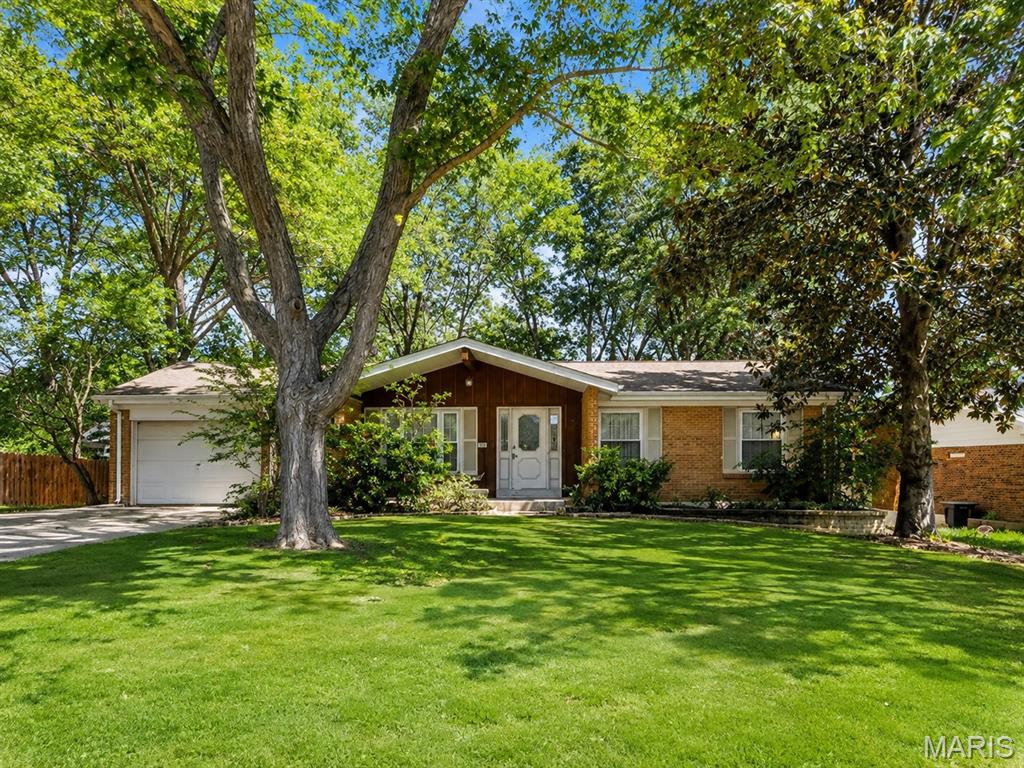 Opportunity awaits in the heart of Ellisville! Located within the Rockwood School District, 319 Cherry Hill offers a chance to create something special in an established neighborhood surrounded by mature trees and convenient access to everything the area has to offer. Shopping, dining, parks, recreation, schools, and major commuter routes are all within easy reach.

This ranch home offers a traditional single level layout, attached garage, established yard, and plenty of potential for a buyer ready to bring their own vision to the property. Whether you're looking for your next home, renovation project, or investment opportunity, the location provides an excellent foundation for what comes next.

Property is being offered AS IS. Seller will not make repairs or provide credits or concessions related to property condition. Seller will not provide inspections. Buyer may perform due diligence at buyer's expense for informational purposes only. Seller prefers offers written with the property's current condition in mind.