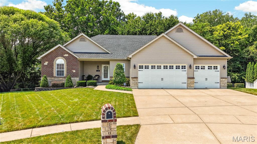 Showings start Sunday 7/19. Be Prepared to be amazed! First, a walkout ranch on a cul de sac and backs to trees...and a 4-car garage (one bay is tandem) with 8FT doors. Stone and brick with vinyl siding, black aluminum fencing, irrigation front side and backyard, large composite deck and stamped patio and a storage shed for your pleasure and convivence!!    Enter into a open floor plan with wood entry, fresh designer paint, new carpet on main soaring ceilings, some as high as 13 ft., Wood burning FP in great room. The kitchen has 42" custom cabinets with granite counter tops, stainless appliances, ceramic and glass backsplash, walk in pantry and double oven. The breakfast room has custom built in buffet for ease of entertaining and overlooks your composite deck and private treed back yard. The large main floor laundry room has built in storage and countertop for folding. This split bedroom floor plan, offers a master suite that is an elegant retreat! Tray ceiling, designer windows fresh carpet and paint! Your master bath with 2 vanities, soaking tub, separate shower and walk in closet will sure to please you! Two nice size bedrooms and a full bath complete the mail floor. The lower level offers a huge family room, media room, and bar. there is a 4th bedroom and full bath as well. The basement has a 9ft pour and lots of natural light making it a great addition to your living and entertaining space. Walk out the lower level to a large stamped concrete patio for even more amazing space!!!
Awesome location. award winning Wentzville school district. This one is sure to please and will not last. 
Seller is offering a VIP Guard Home Warranty policy with purchase.
  
.