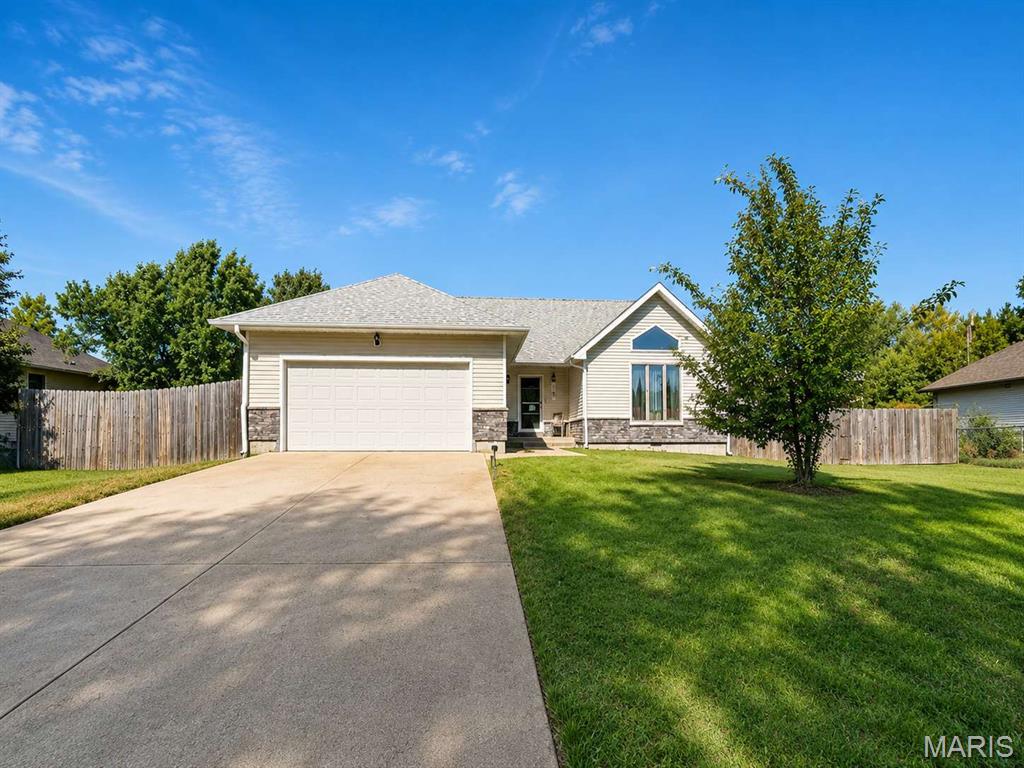 Welcome to this inviting Lebanon home offering comfortable one-level living in a convenient neighborhood setting. The open living and dining areas create an easy flow for everyday living and entertaining, while the vaulted ceiling adds an airy feel. A versatile bonus room provides space for a home office, playroom, or sunroom. Enjoy the fenced backyard, attached two-car garage, and proximity to local parks, schools, and amenities. A great opportunity to make this established home your own!