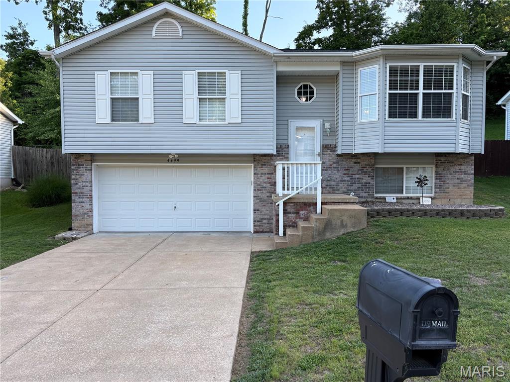 Beautifully updated 3 bedroom,2 bath split foyer home backing to woods for added privacy. This move in ready home features a newer roof, new HVAC system, 6 panel doors throughout upstairs, newer appliances, and a lower sleeping area with a huge walk in close. The home also offers a large fenced in backyard.  Make this home your own! Come see me at the open house May 17th from 1-3!