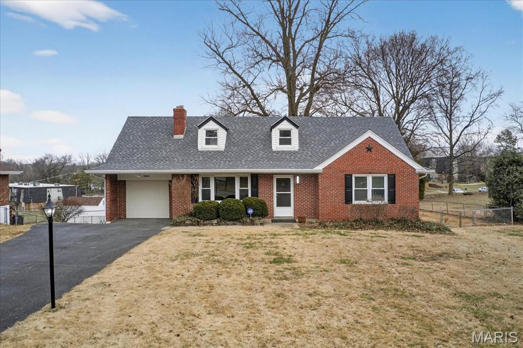 BE SURE YOU HAVE THE ALARM CODE.  Agent Owned. Back On The Market Through No Fault Of The Seller. FHA Appraised $260000. Beautifully and recently updated 1.5 story brick w/4brs. 3 full baths, part finished walk-out basement, 1-c attached garage(20 x 11w/opener that leads directly into the home, all this sitting on almost 1/2 acre. The main floor has 2 brs,1 full updated bathroom, all new flooring, new paint, walls & ceilings, double pane insulated windows w/marble sills, white 6 panel doors w/black hardware, new light fixtures through out, new kitchen w/quartz counters, new Samsung stainless steel appliances w/5 burner gas range and pantry w/barn door. The upper level has 2 brs, 1 full updated bath & fresh paint. The primary bedroom is located on the upper level with a spacious dressing room or nursery or could be converted into a large walk-in closet. The lower level w/walk-out is finished and has new paint on walls & ceilings, epoxy flake painted floors, full bath and what might be the 5th bedroom with w/egress windows. This lower level w/a private entrance might be ideal for an older child or in-law quarters. Outback is a deck, huge patio space, storage shed w/concrete floor and fenced yard. The roof and electric panel box are both new in 2025, the hvac is approximately 4 years old & there is a 65 gallon water heater. Permits were pulled for both the panel and hvac. This home is located on a semi private street of mostly well cared for brick homes with only one way in or out. St. Louis County Code Compliant. THE MAX OCCUPANCY FOR THIS PROPERTY IS 14.