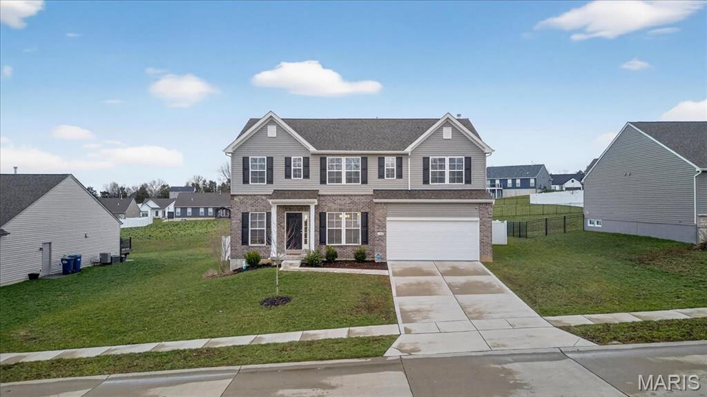 Built in 2023, this Pacific 2-story offers a layout designed for real life, with space to gather, work, and relax. Just off the foyer, a private study and formal dining room provide flexible options for everyday living or hosting.
The kitchen, breakfast area, and great room connect seamlessly to create the heart of the home. Granite countertops, a center island, pantry, and abundant cabinetry make the kitchen both functional and inviting.
Upstairs, the oversized primary suite features a walk-in closet and private full bath, along with 3 additional bedrooms, a shared full bath, and a spacious loft.
The unfinished walk-out lower level offers storage or future living space. Outside, enjoy a fenced backyard and covered deck—perfect for morning coffee or weekend gatherings.
Main-floor laundry and a 2-car garage add everyday convenience.
Located with convenient access to Hwy 44, this home offers an easy commute from areas like Fenton and Arnold while being close to local dining, shopping, and everyday conveniences. Enjoy nearby outdoor activities like fishing and hiking, with weekend trips to St. James wineries just a short drive away. Come see your new home today!