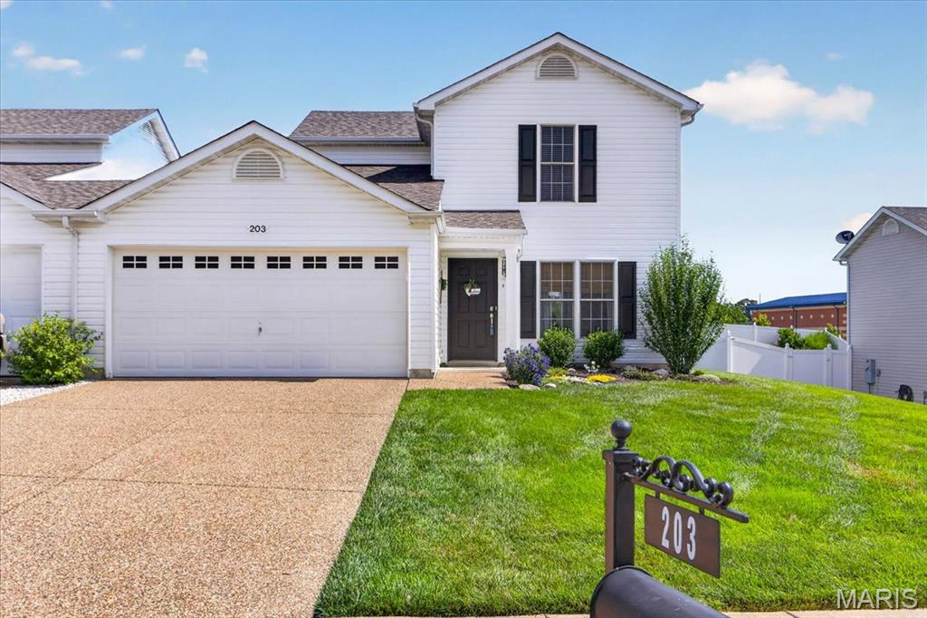 Fall in love with this beautifully updated end-unit home featuring 2 bedrooms and 2.5 bathrooms with no shared common area walls. From the moment you step inside, you'll appreciate the fresh tasteful decor and wood plank flooring throughout main level. The kitchen shines with white cabinets stainless steal appliances, and granite countertops. Dining area has sliding glass doors to patio and backyard. Storage is abundant with an oversized pantry,  main floor laundry room, garage, and garage attic—providing plenty of space to keep everything organized. Primary bedroom retreat has full bathroom w/ tub & shower combo plus a walk in closet. Step outside to enjoy the extended patio overlooking a large, level backyard, perfect for relaxing or entertaining. Situated on a desirable corner location, this move-in-ready home combines style, functionality, and privacy. Don't miss your opportunity to make it yours!