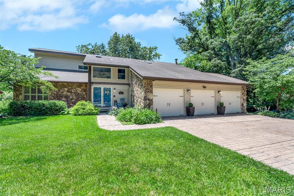 Welcome home to 320 Jubaka Drive! This updated and move-in ready home offers 3 bedrooms and 2.5 bathrooms, perfectly situated on a generous 1.5+ acre lot that boasts prime lake views! This provides both privacy and room to enjoy the outdoors from your covered patio, hot tub, fire pit or primary suite balcony. Step inside to find an open layout with ample living space, ideal for both everyday living and entertaining. The main level offers multiple gathering areas, while the upper level features three bedrooms, including a primary suite with its own private bath and laundry. The list of recent updates include: HVAC 2024, new paint, new LVP flooring throughout, dishwasher 2025, light fixtures, updated bathrooms, and a full unfinished basement with tons of potential. Located in an established neighborhood, this home offers convenient access to shopping, dining, and major highways, making commuting to the St. Louis metro area a breeze. Don’t miss your opportunity to own a home with space, potential, and a prime location. Schedule your showing today! Information pulled from various sources. Buyer to verify all MLS data