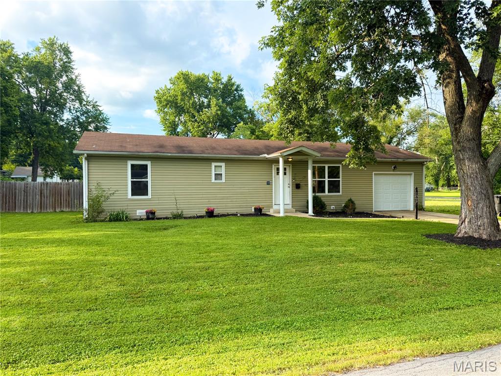 The search is over… welcome home to 1309 2nd St in Cottage Hills!
This charming, move-in ready home has so much to offer with 2 bedrooms, 2 bathrooms, an open floor plan, and an abundance of natural light throughout. The spacious family room creates the perfect place to gather, relax, and make memories.
Need more space? You’ll love the large yard PLUS an additional lot included, giving you room to garden, play, entertain, or simply enjoy the outdoors. With an attached garage, main floor laundry, and a location in the Bethalto School District, this home checks so many boxes!
Whether you’re a first-time buyer, downsizing, or looking for a place to settle in, this is the one you’ve been searching for.